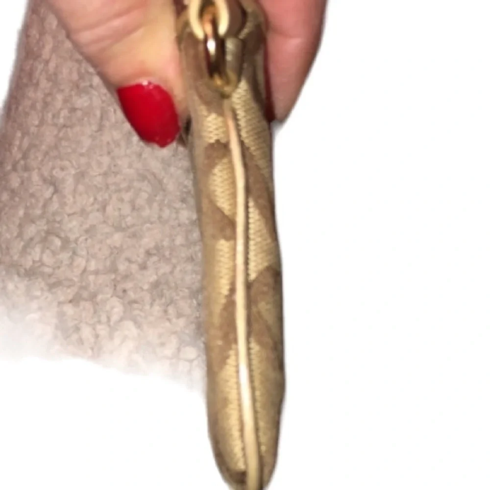 Coach brown & tan monogram wristlet & hang tag matching pieces available
